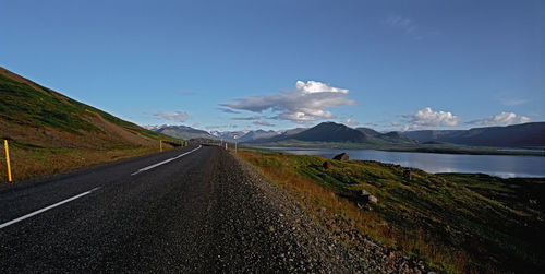 Empty road along the fjord skagafordur in north iceland