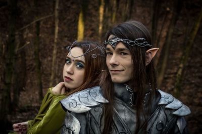 Portrait of a beautiful young woman in forest