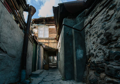 Alley amidst old buildings