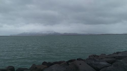 View of sea against cloudy sky