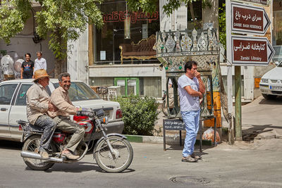 People on street in city