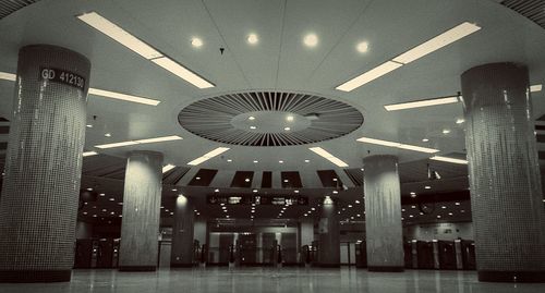 Low angle view of illuminated modern building at night