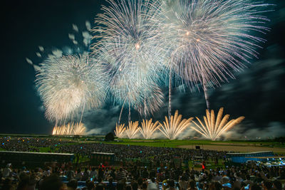 Firework display at night