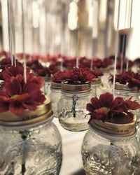 Close-up of red roses on table