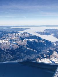 Aerial view of landscape and mountains against sky