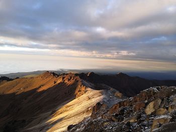 Scenic view of rocky mountains against sky