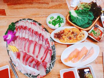 High angle view of sushi served on table