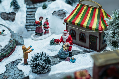 High angle view of figurine sculpture during winter, christmas property