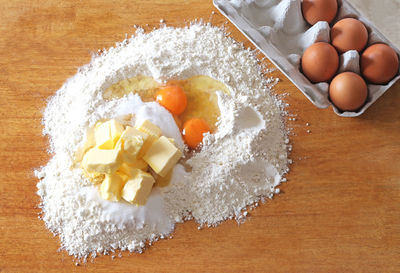 High angle view of eggs in container on table