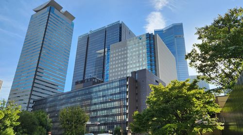 Low angle view of skyscrapers against sky