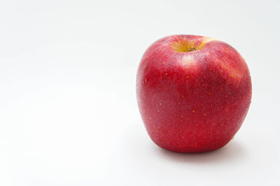 Close-up of apple against white background