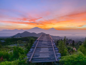 Scenic view of mountains against sky during sunset