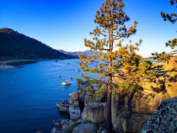 Scenic view of calm sea against clear sky