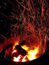 Close-up of illuminated bonfire at night