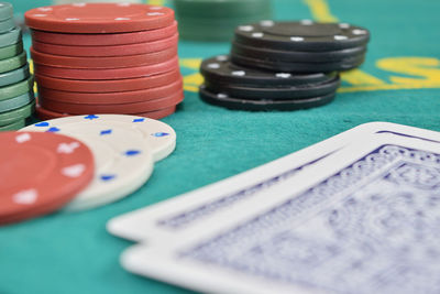 Close-up of gambling chip on table