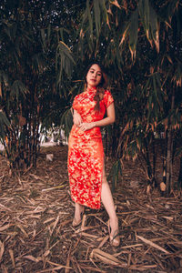 Beautiful woman standing on field