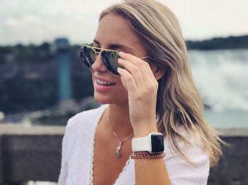 Portrait of mature woman using smart phone outdoors
