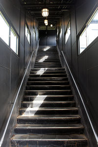 Low angle view of illuminated staircase in building