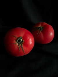 Close-up of red cherries on table