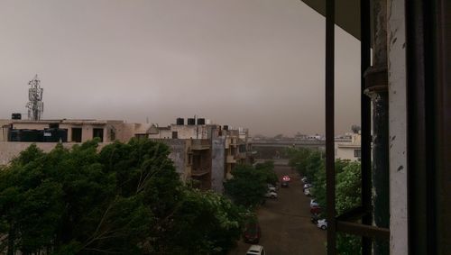 Buildings in city against sky