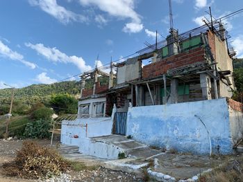 Abandoned building against sky