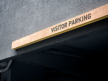 High angle view of information sign on road in city