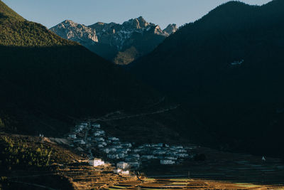 Scenic view of mountains against sky at night