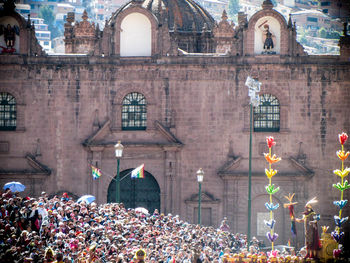 Group of people in front of historical building