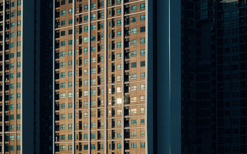 Lots of windows of the large building