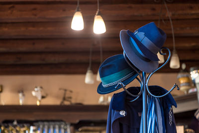 Close-up of illuminated lighting equipment at restaurant