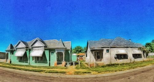 Houses against blue sky