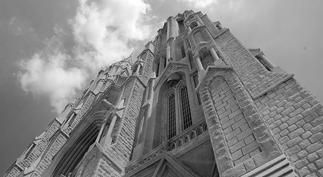 architecture, building exterior, built structure, low angle view, sky, place of worship, cloud - sky, religion, church, spirituality, history, cloudy, cloud, day, outdoors, cathedral, building, no people