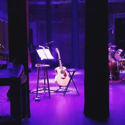 View of empty chairs at night