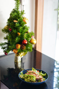 Fried salad plate on a stone table