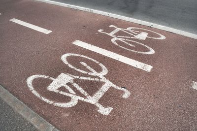 High angle view of text on road