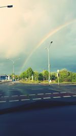 Road against cloudy sky