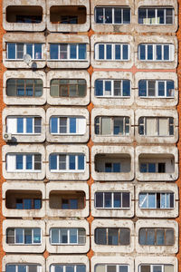 Full frame background and texture of mid-russian concrete and brick high rise residential building