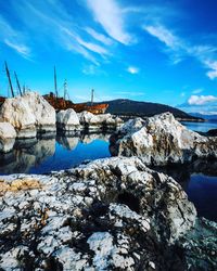 Scenic view of sea against blue sky