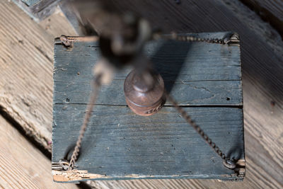 High angle view of weight scale on wooden floor