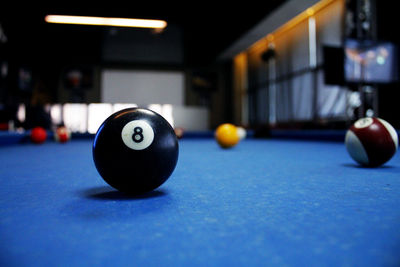 Close-up of pool balls on table