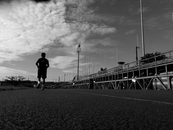 Full length of man with city in background