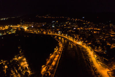 High angle view of illuminated cityscape at night