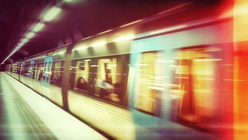 Blurred motion of train at subway station