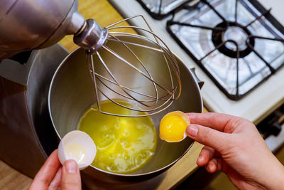 Midsection of person preparing food