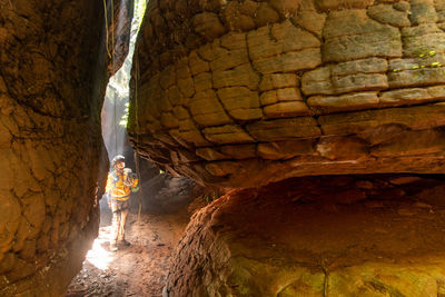 Man standing in cave