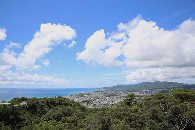 Panoramic view of townscape by sea against sky