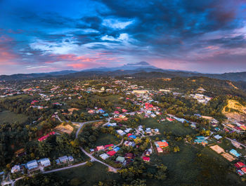 High angle view of townscape against sky during sunset