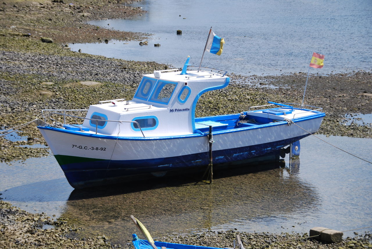 Blue and withe boat