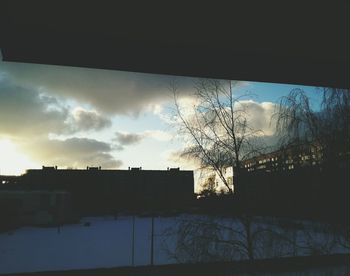 Silhouette of buildings at sunset