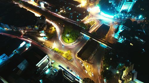 Aerial view of illuminated city at night